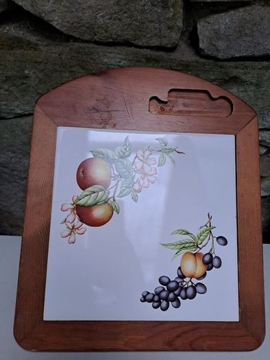 Vintage wooden cheese board with tile