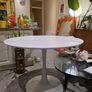Classic mid-century / Space Age white tulip dining table with a heavy metal pedestal base Image 2