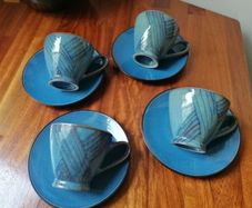 4 Coffee/Tea Cups and Saucers