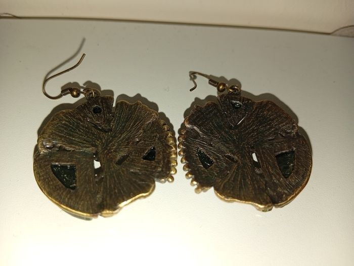 Vintage Brass Tone Drop Earrings With Ornate Scrollwork Filigree And Green Textured Stones