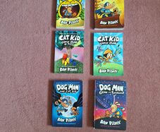 4 Dog Man and 2 Cat Kid Books