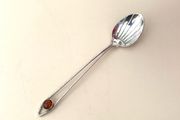 Antique coffee spoon with amber