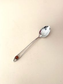 Antique coffee spoon with amber