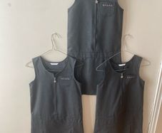 3 M&S grey pinafores (as new) age 9-10