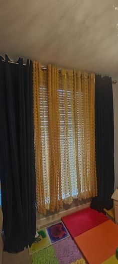 Set of 8 Mustard Pom Pom Voile Eyelet Curtains