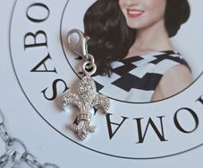 Thomas Sabo Fleur-de-lis (Lily Flower) charm pendant from the  Charm Club collection.