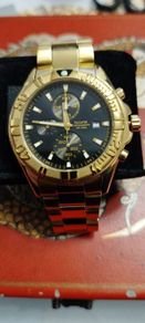 accurist mems gold tone watch