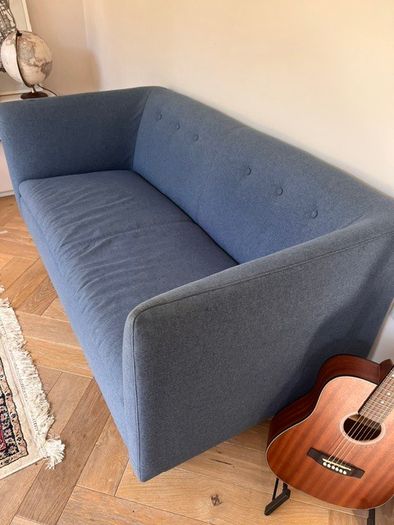 Blue two-seater sofa - button back detail