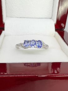 Silver Tanzanite Trilogy Ring in Platinum Overlay Sterling Silver.