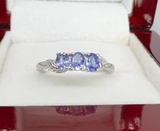 Silver Tanzanite Trilogy Ring in Platinum Overlay Sterling Silver.