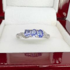 Silver Tanzanite Trilogy Ring in Platinum Overlay Sterling Silver.