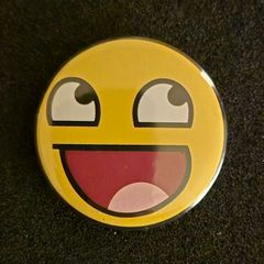 Smiley face, pin back button badge.