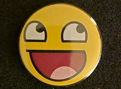 Smiley face, pin back button badge.