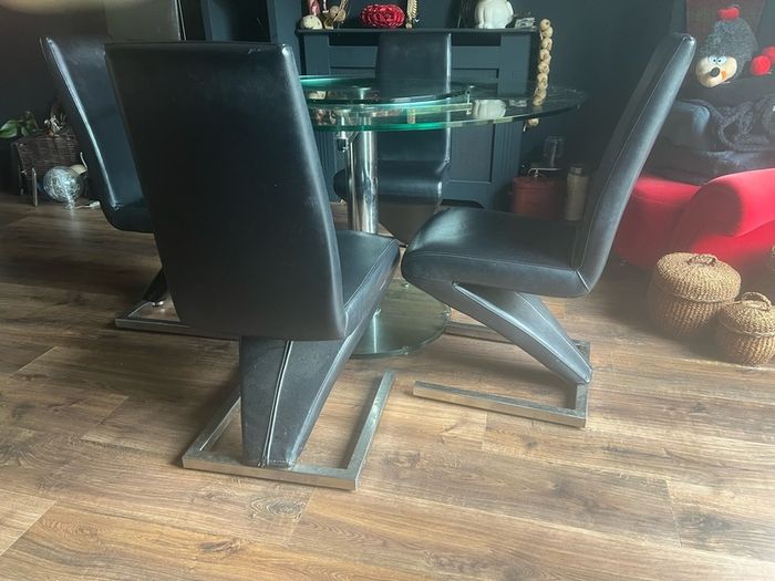 Glass dining table with rotator and 4 leather chairs