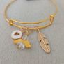 gold retractable charm bracelet Image 2