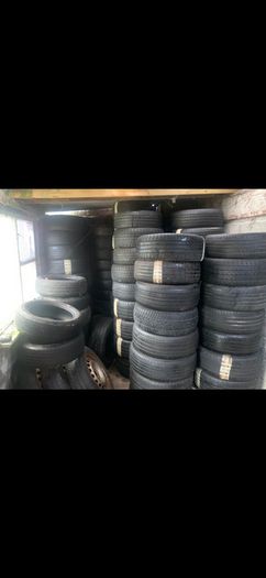 Red mount wheel balancer and 100 part worn tyres for sale