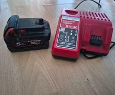 Milwaukee 5.0 Ah Battery and charger