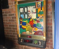 Wall mounted jukebox