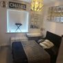 Double bed with headboard and separate storage trunk. Image 4