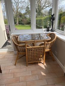 Cane dining table and chairs