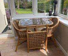 Cane dining table and chairs
