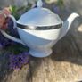Brown Thomas Porcelain Teapot in white and silver Image 3