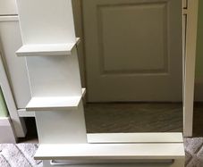 Mirror with shelves