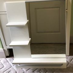 Mirror with shelves