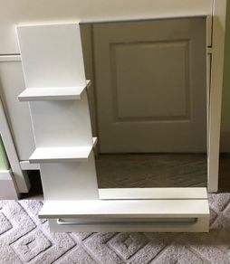 Mirror with shelves