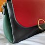 Beautiful handbag with a beautiful colour scheme of black, red and green with adjustable and removable shoulder strap Image 9