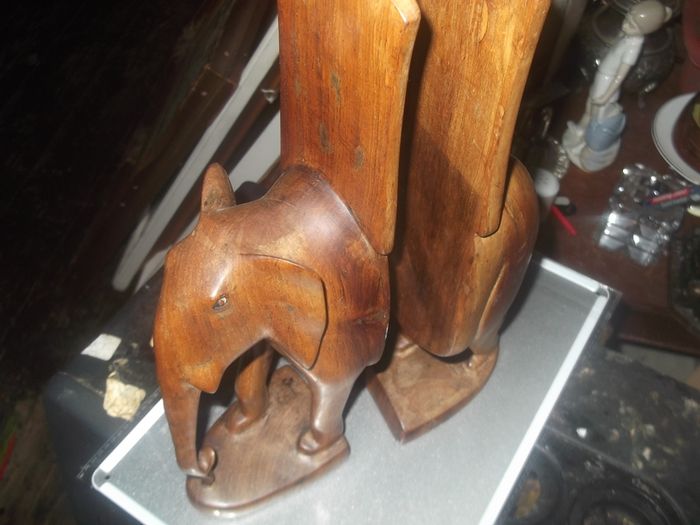 a pair of vintage wooden elephant bookends
