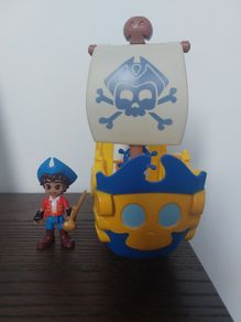 Santiago with pirate ship toy