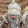 Five Brand New NUBY  Natural Touch 3 Stage Wide Neck Transitioning Bottle to Cup (240ml ) +  Soother  SAMPLE  PACK Image 2