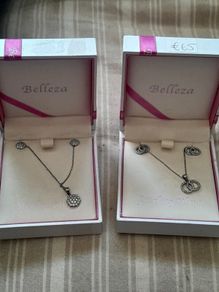 ladies silver chain and pendant and earrings