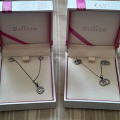 ladies silver chain and pendant and earrings