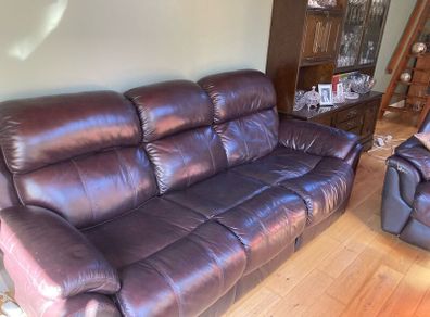 Reclining leather couch and two reclining chairs