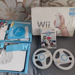 Wii + box, controllers, steering wheels, Mario Kart, Wii Sports