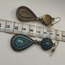 Vintage-style long bohemian drop earrings featuring turquoise enamel and a bronze-tone metal finish. Image 3