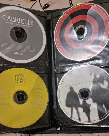 80 CD + Case. All CD's in perfect playable condition.