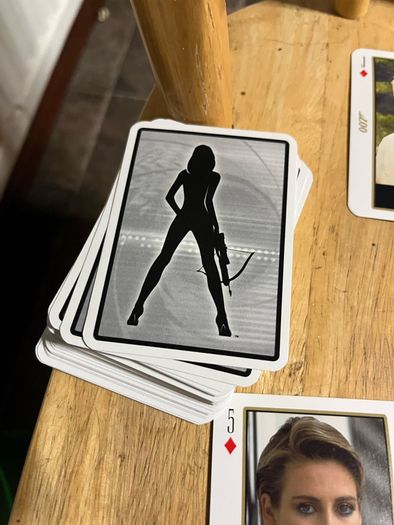 OO7 Bond girls playing cards
