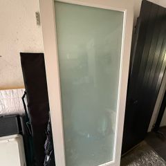 Heavy solid-core oak internal doors with frosted glass panels