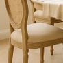 Beautiful solid oak & hand painted - antique French style dining table and with 4 rattan/ weave chairs Image 4