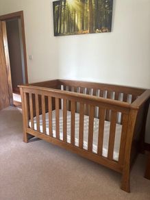 1) Cot. 2) changing unit. 3) wardrobe