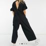ASOS Design jersey smock jumpsuit with frill sleeve in black Size UK 8 Image 2