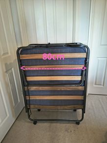 Single foldable guest bed with mattress