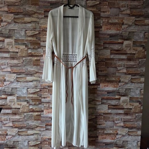 White crochet and pleated beach cover-up dress with a brown belt. Size 10