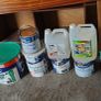 a selection of paint and a paint roller and some good paint brushes Image 2