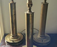 Art deco set of three brass column table lamps