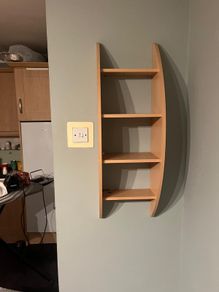 Wall shelving unit