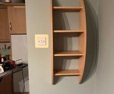 Wall shelving unit